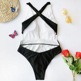 One-piece women's swimsuit with metal belt closure