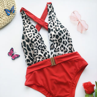 One-piece women's swimsuit with metal belt closure