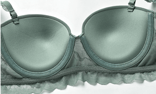 Green lace push-up bra with detachable straps and half-cup design, offering sexy and charming style for women.